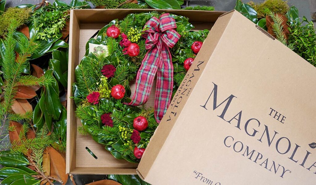 Magnolia Wreath in box, with lid partially removed